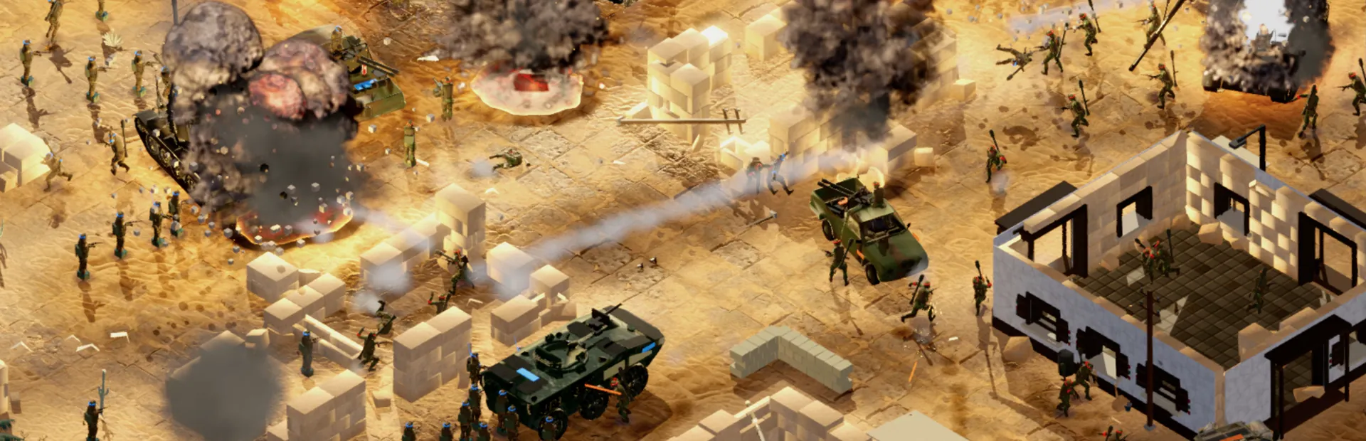 A desert village under attack: infantry in the ruins of mud-brick houses, armoured carriers in the streets and smoke over the rooftops.