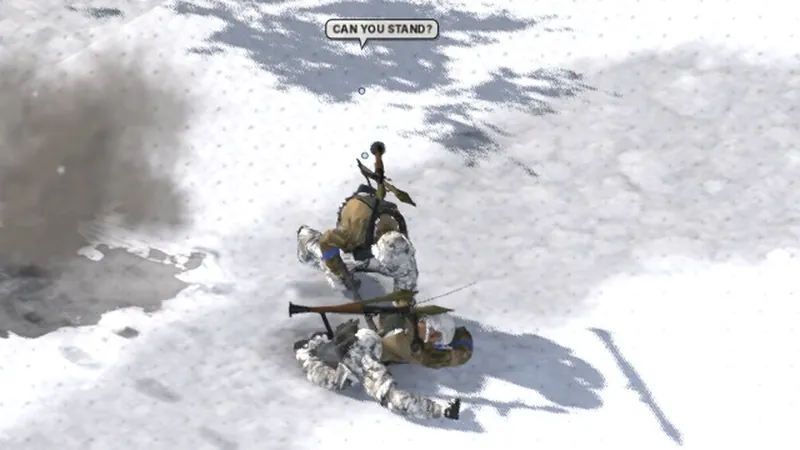 A soldier helps a wounded man up from the snow.